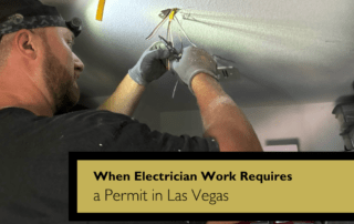 Two electricians work on ceiling wiring during a repair, with a caption about permits in Las Vegas.